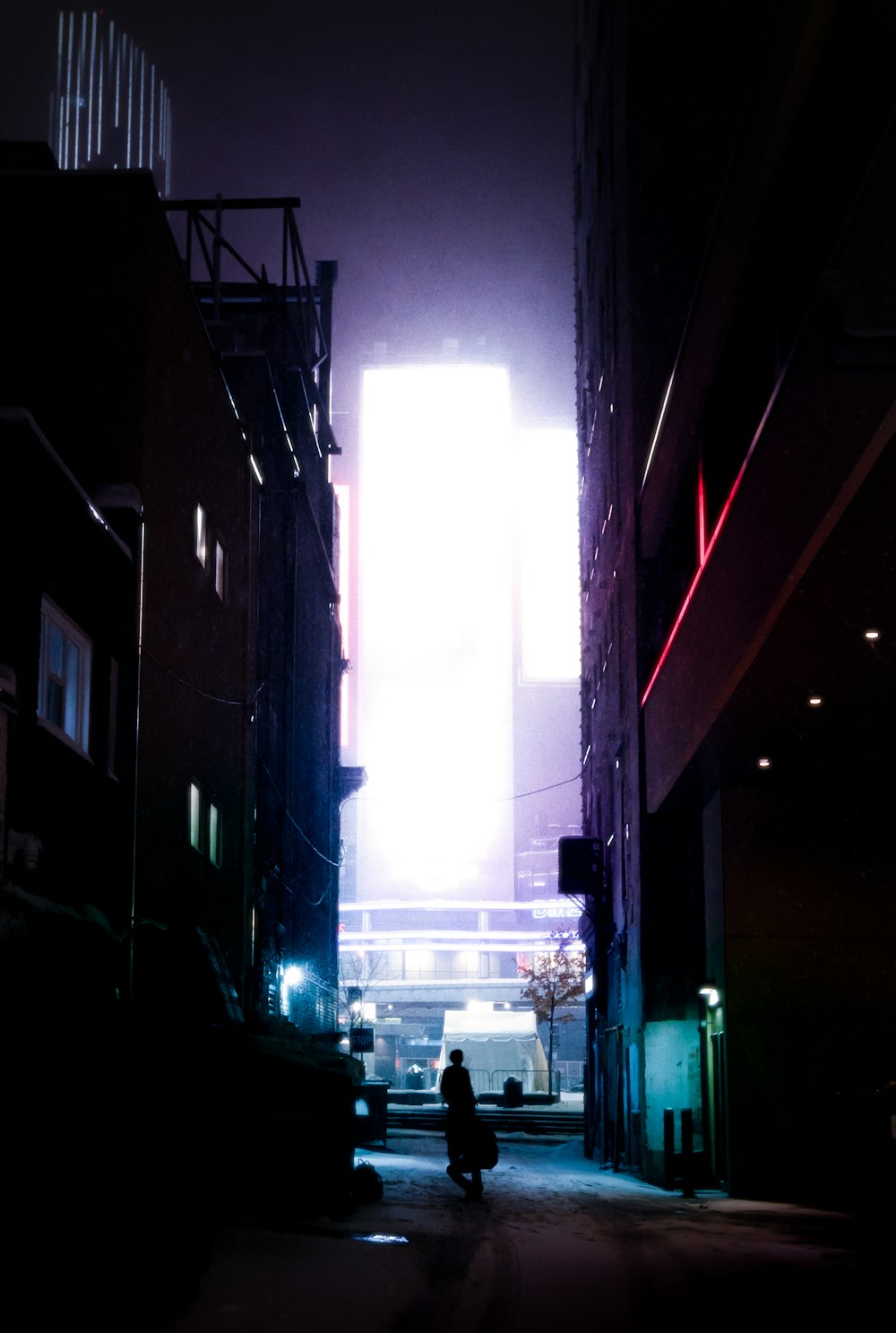 silhouette of person walking on street