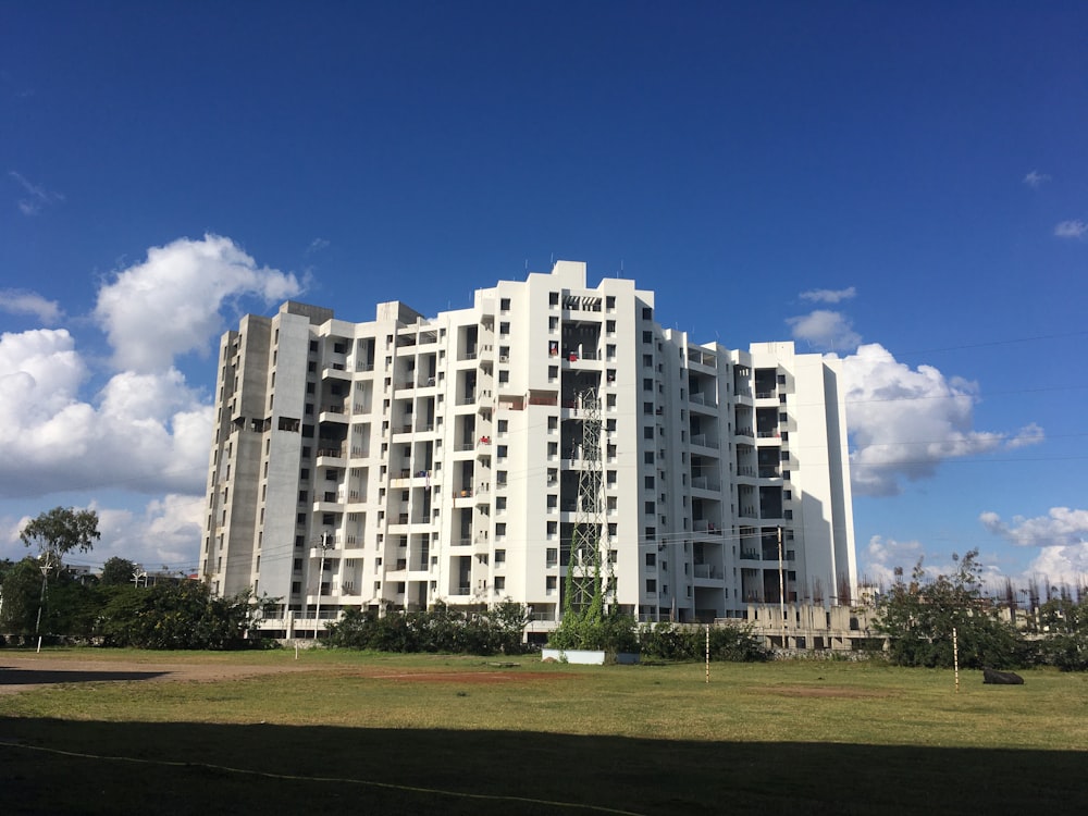 white concrete high-rise building during daytime