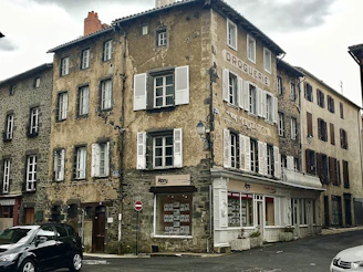 black SUV parked behind house