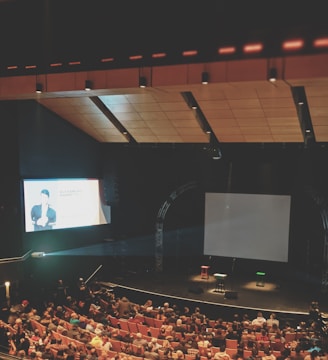 group of people inside the theater