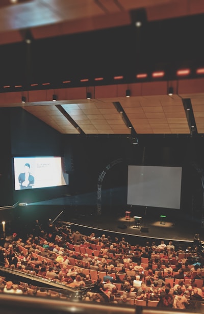 group of people inside the theater