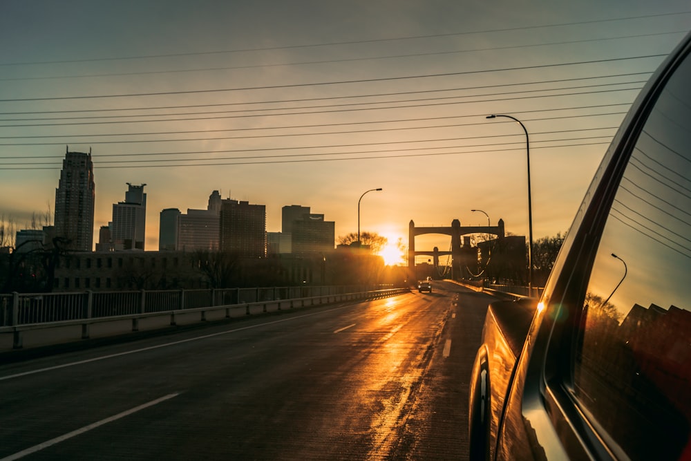 vehicle on roadway during golden hour
