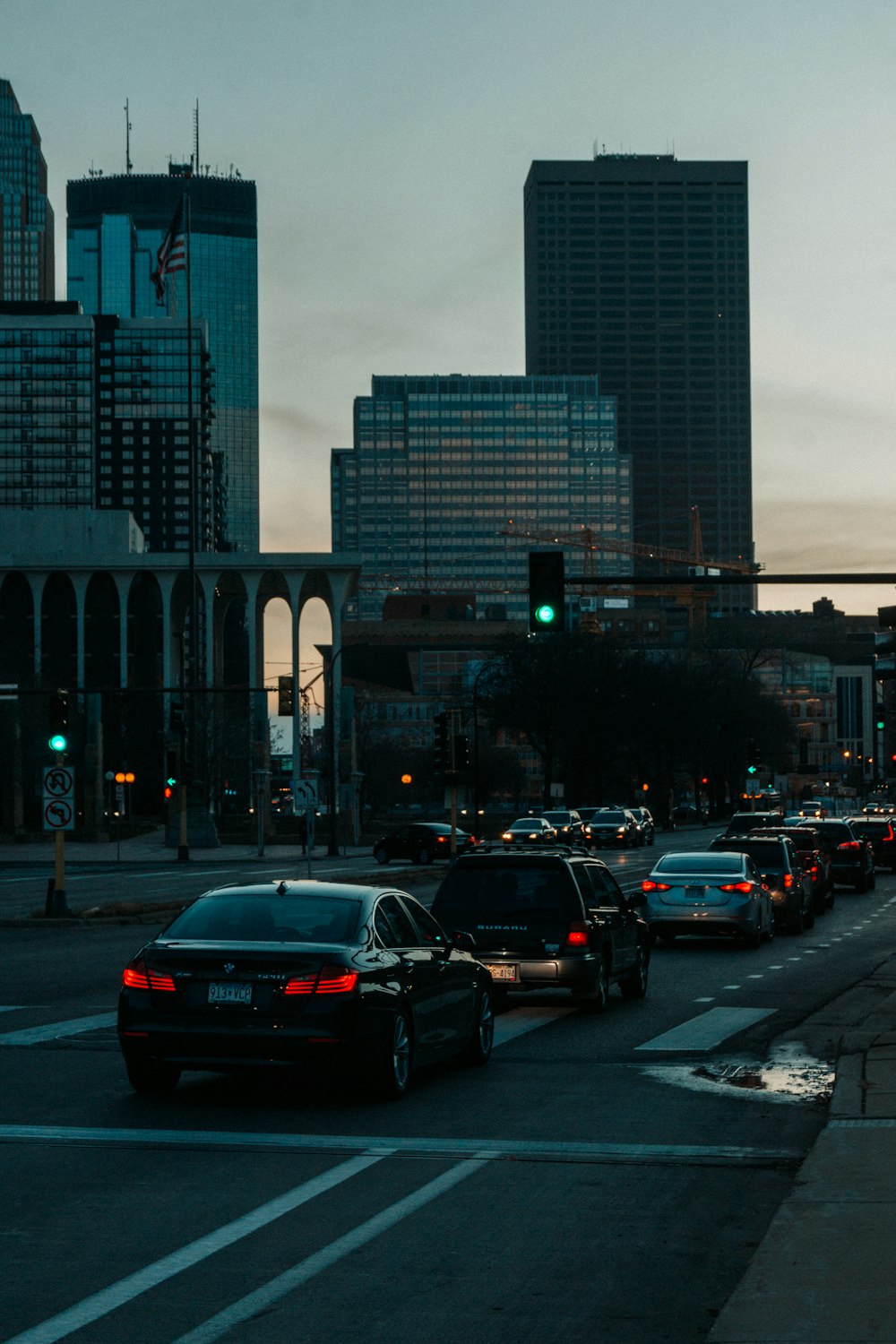 vehicles on road during daytime