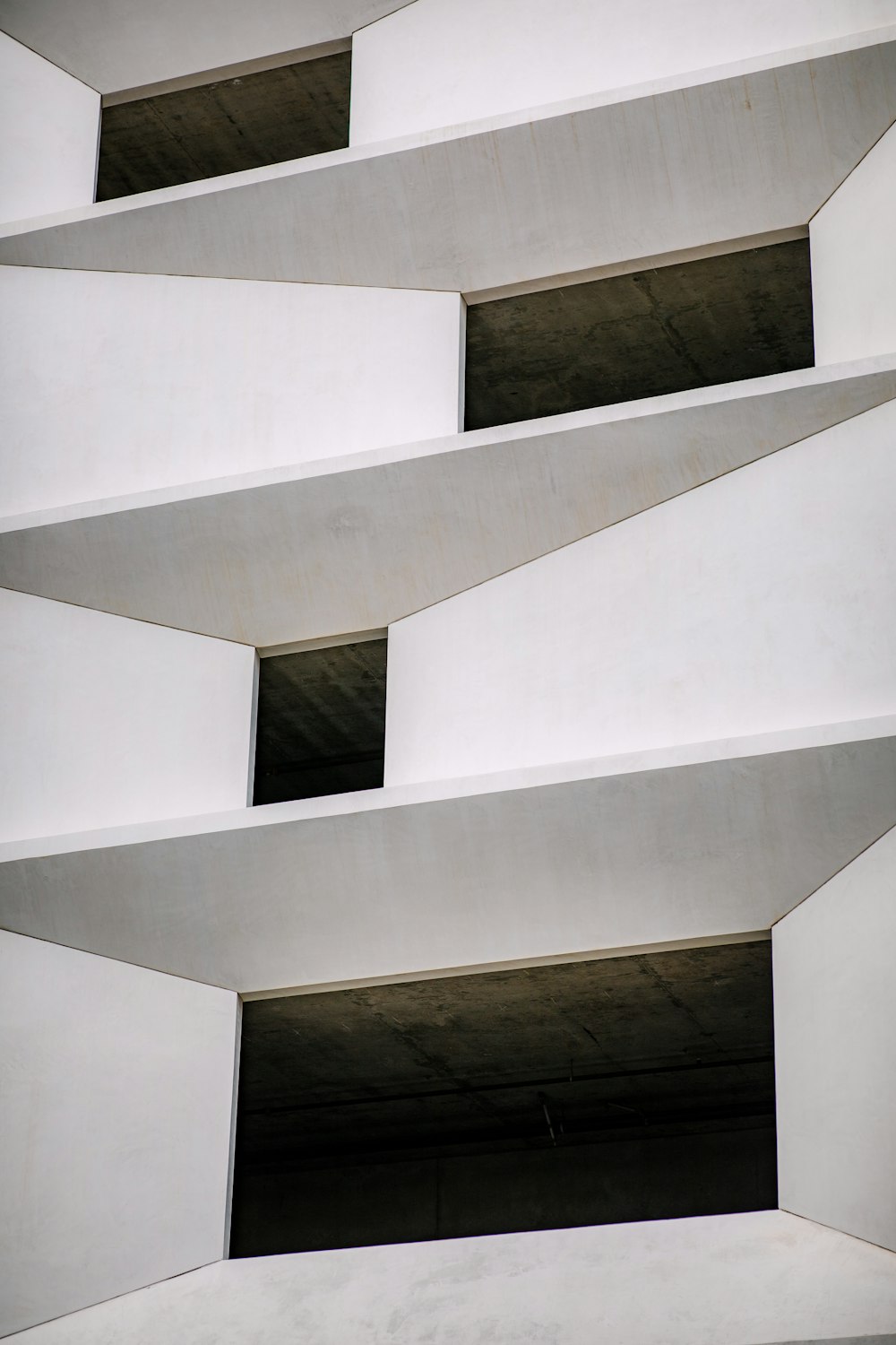 close-up photography of white concrete building