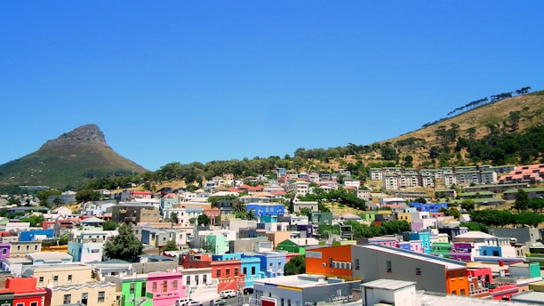 A scenic view of a vibrant neighborhood with people engaging in local activities.