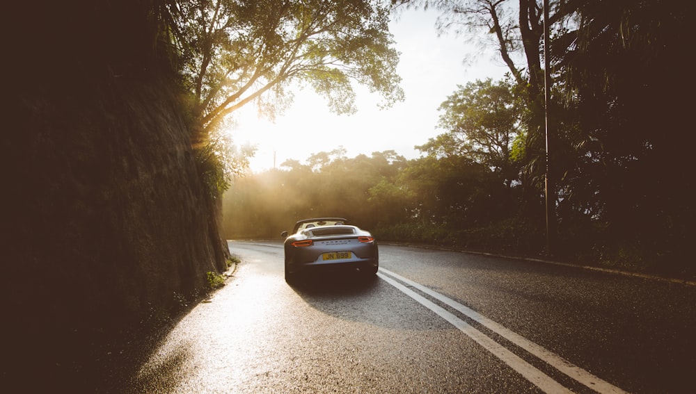 grey car on road