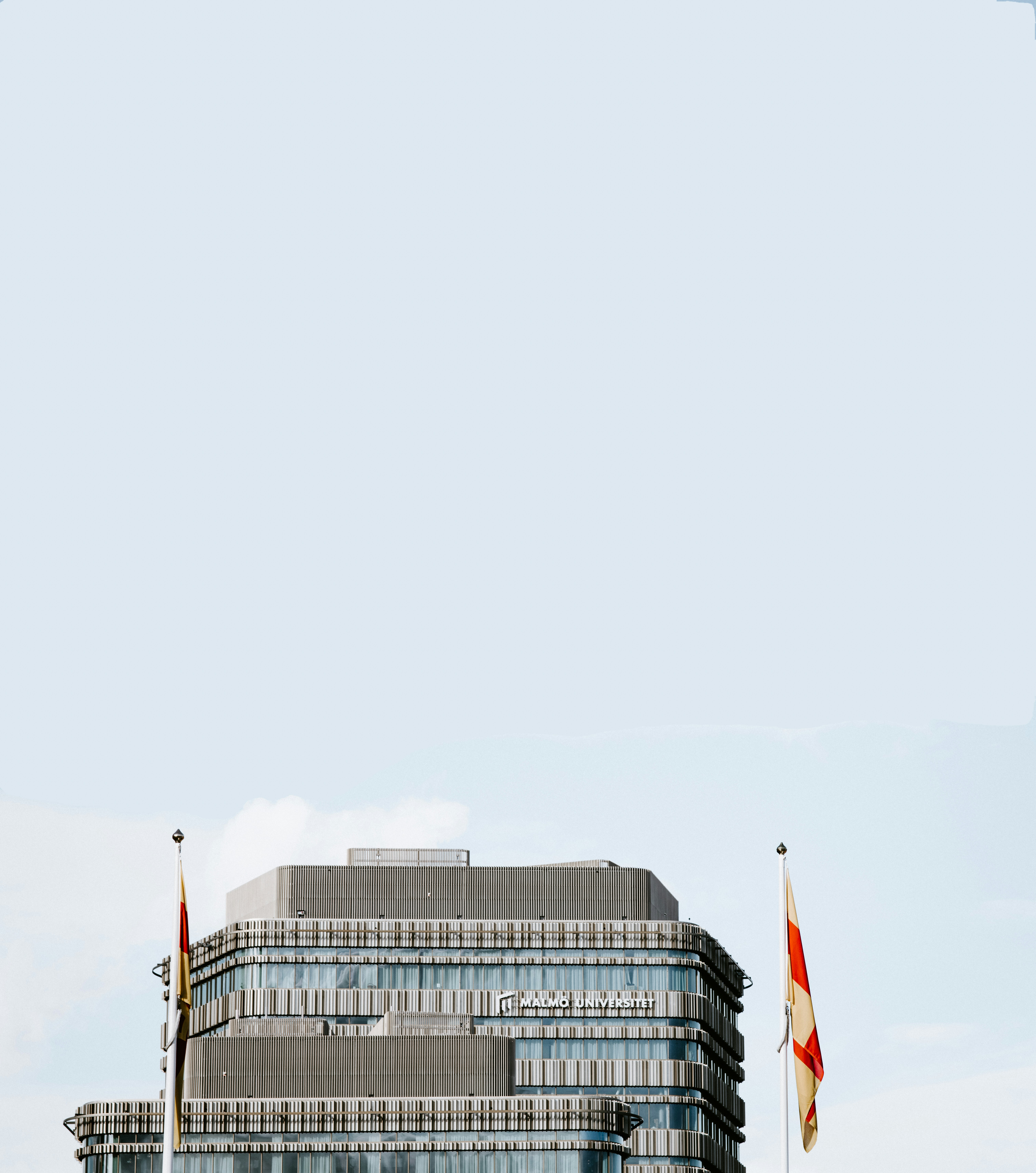 two red flags near building