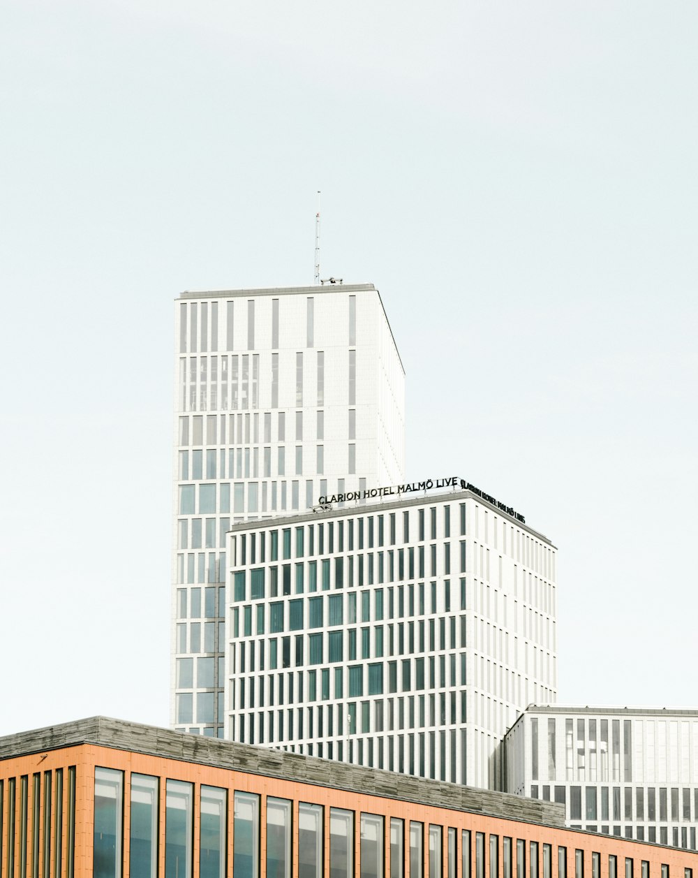 view photography of concrete high rise building