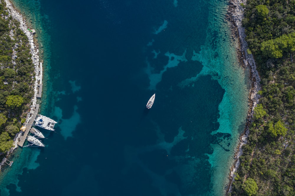 aerial photography of white yacht on sea