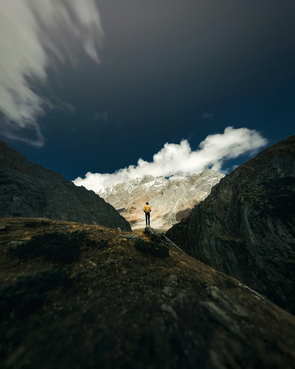 person standing on mountain
