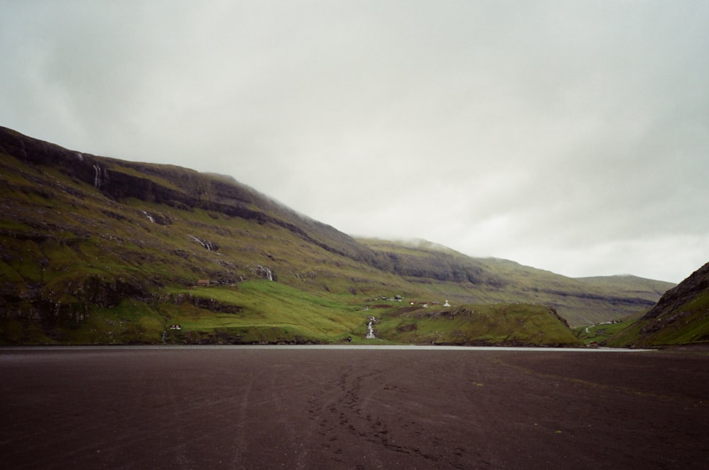 asphalt road and green mountain scneery