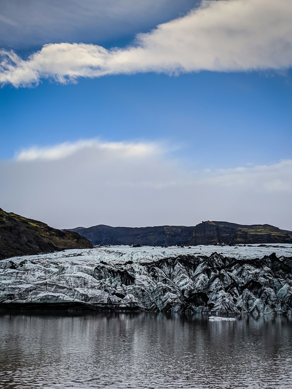 mountain near body of water