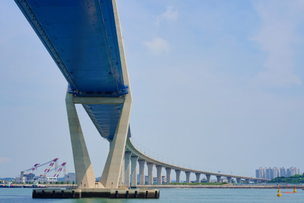 concrete bridge over water at daytime