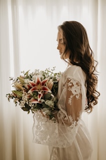woman holding flowers