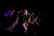 A group of musicians performing together on stage, showcasing their passion for music.