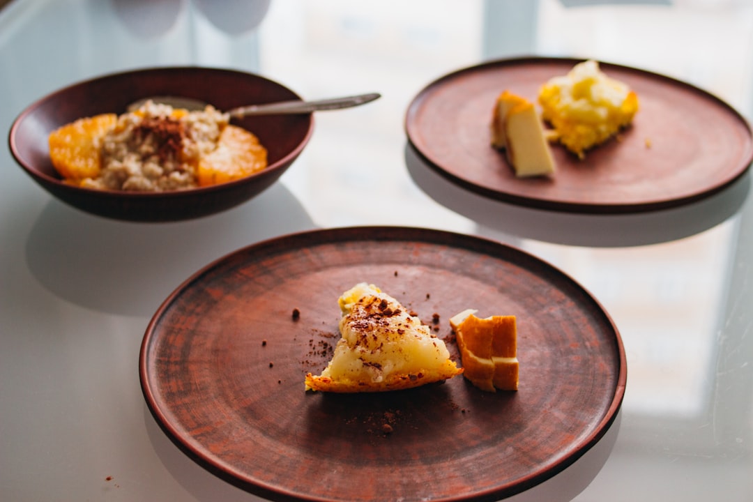 three brown wooden plates