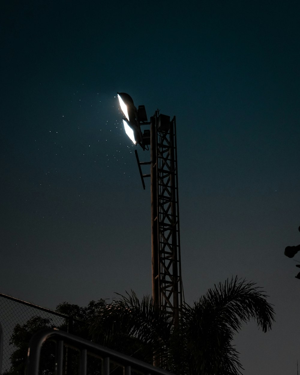 a street light is lit up at night