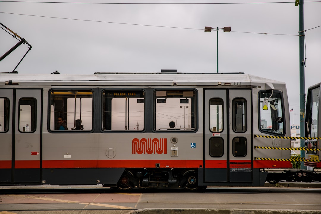 gray and red train