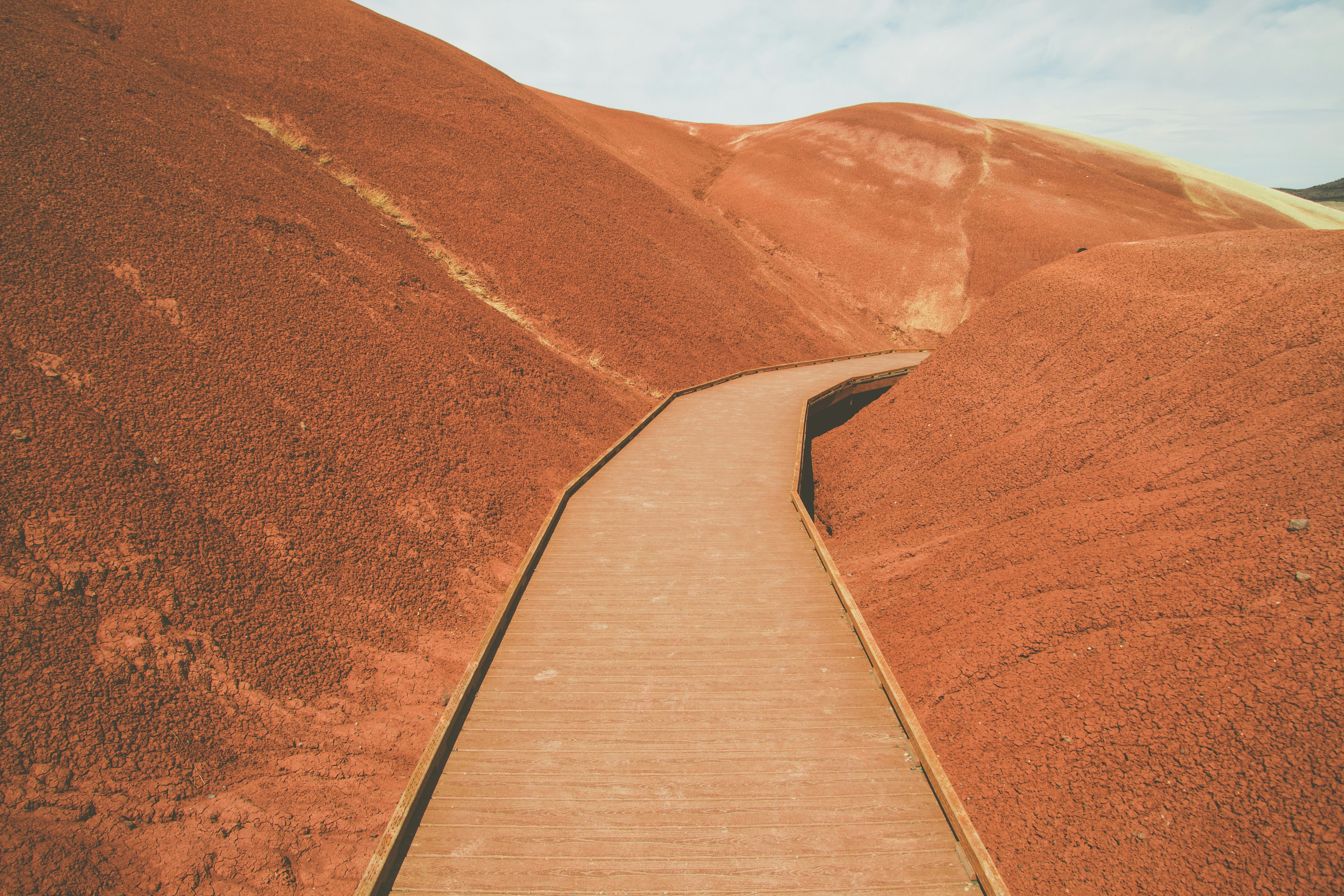 brown mountain and pathway scenry