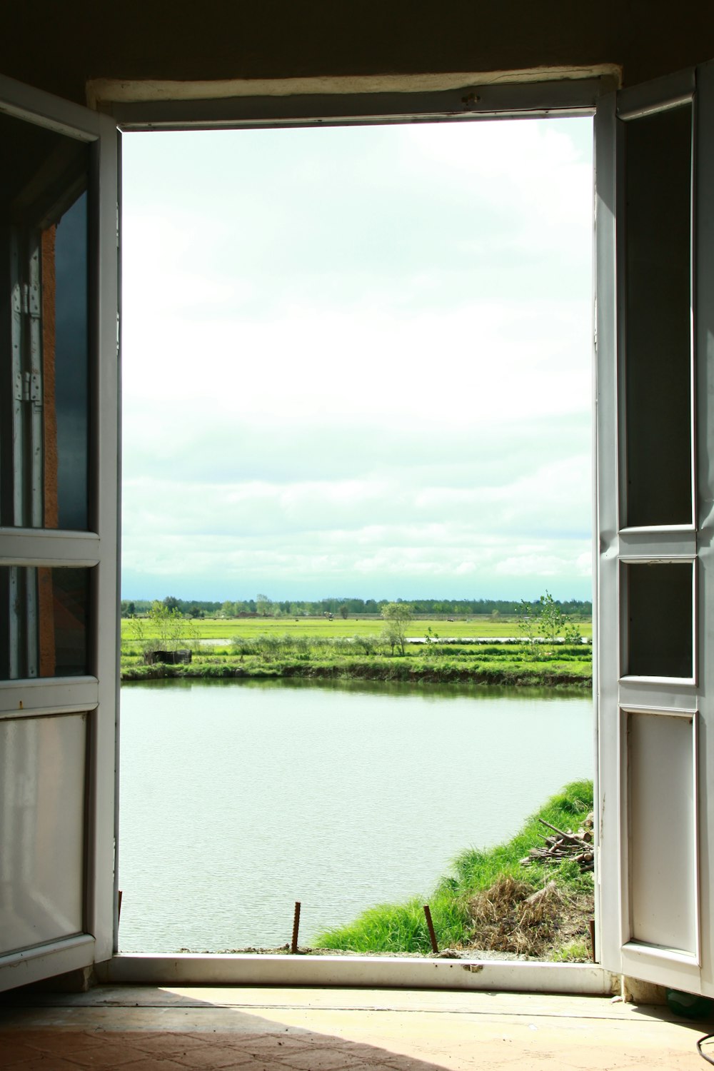 opened white wooden door during daytime