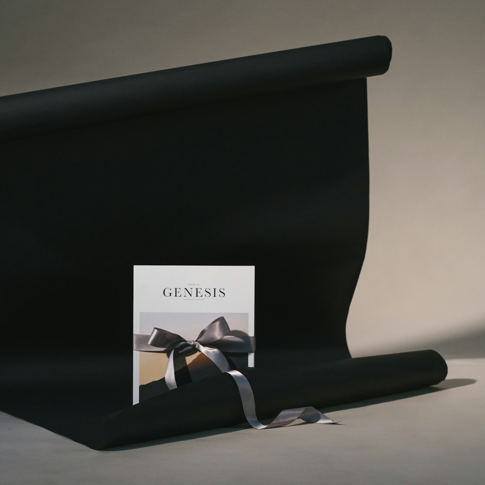 Genesis book on black surface
