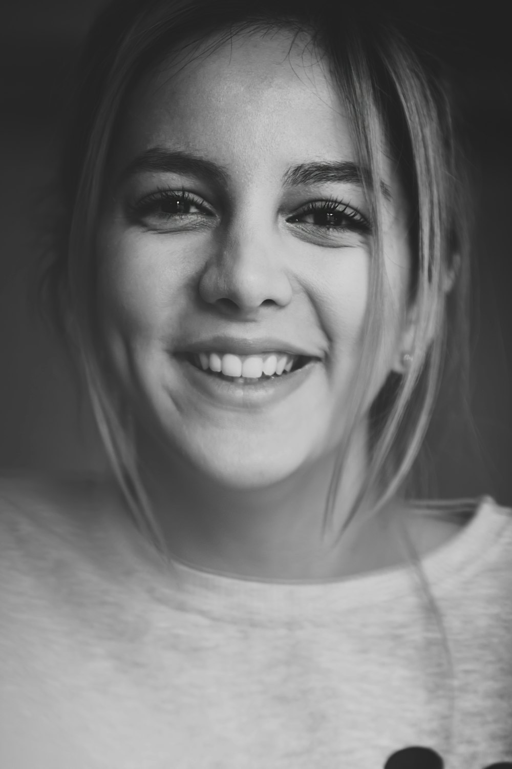 portrait photograph of woman in crew-neck shirt