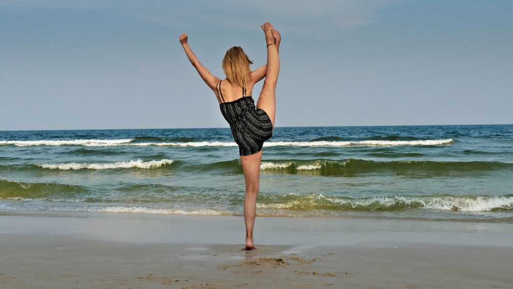 woman standing on seashore