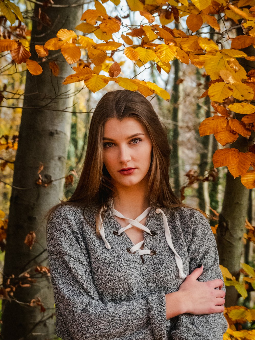 woman in gray sweater