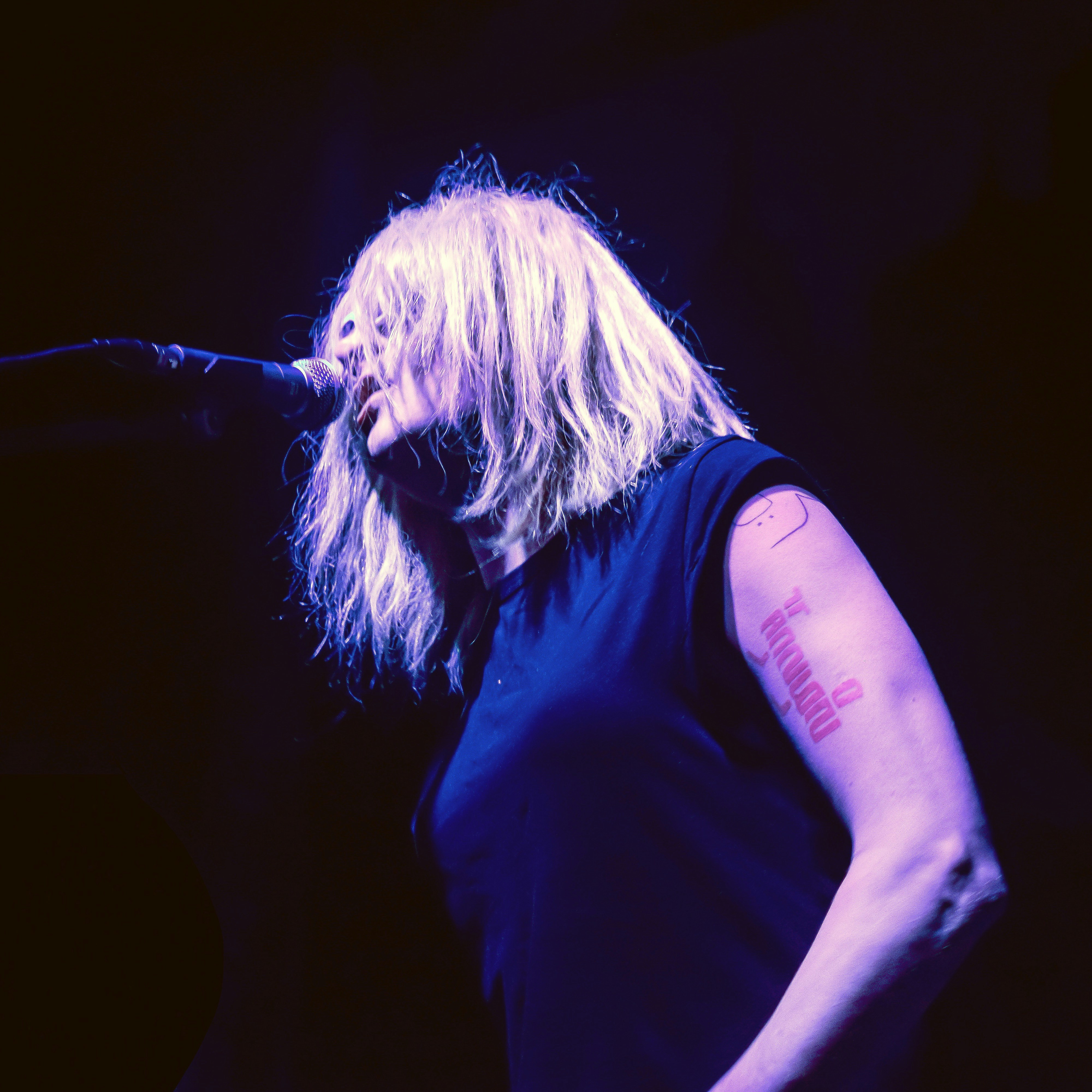 woman in front of microphone