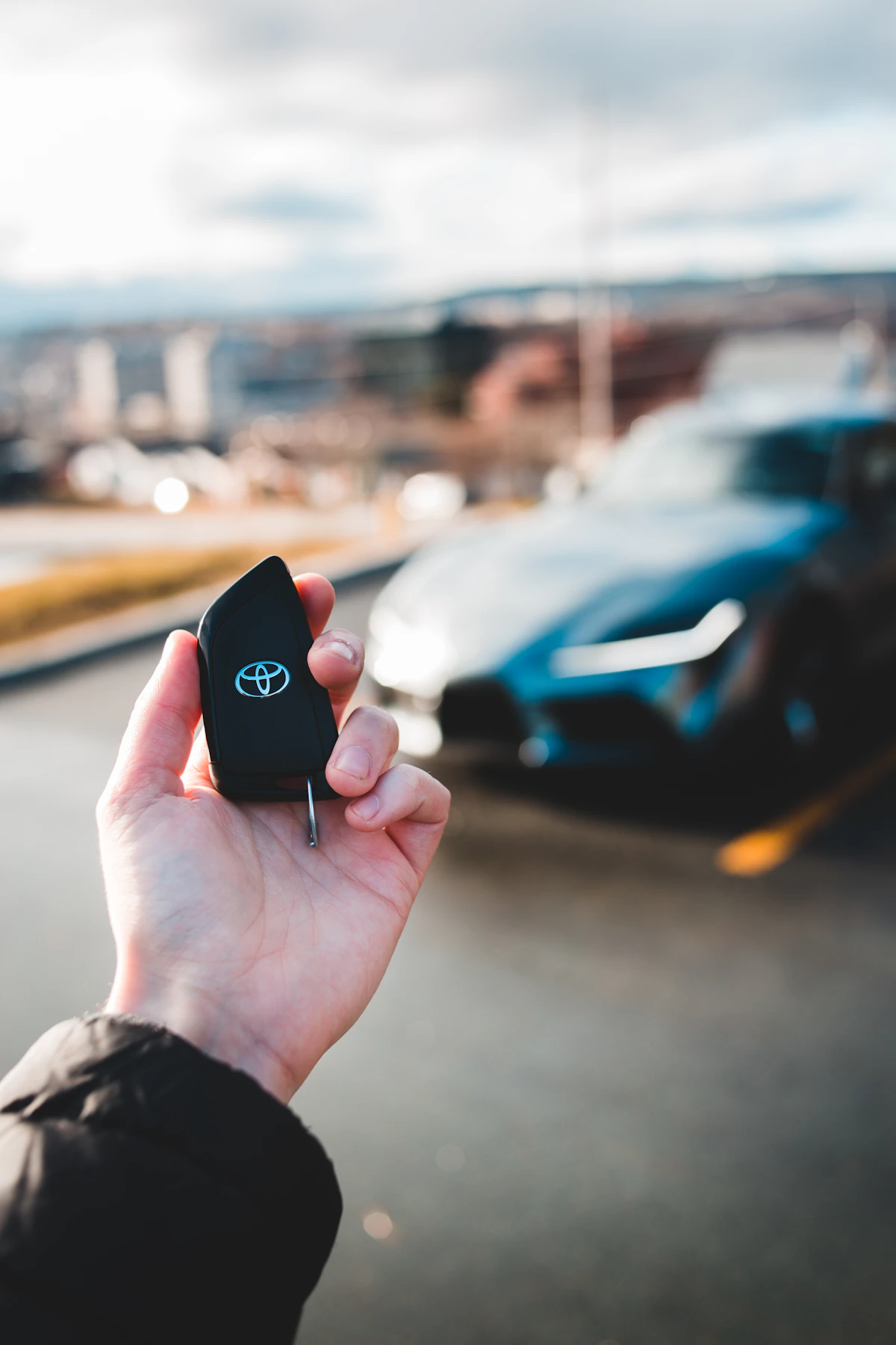 Car key remote in hand