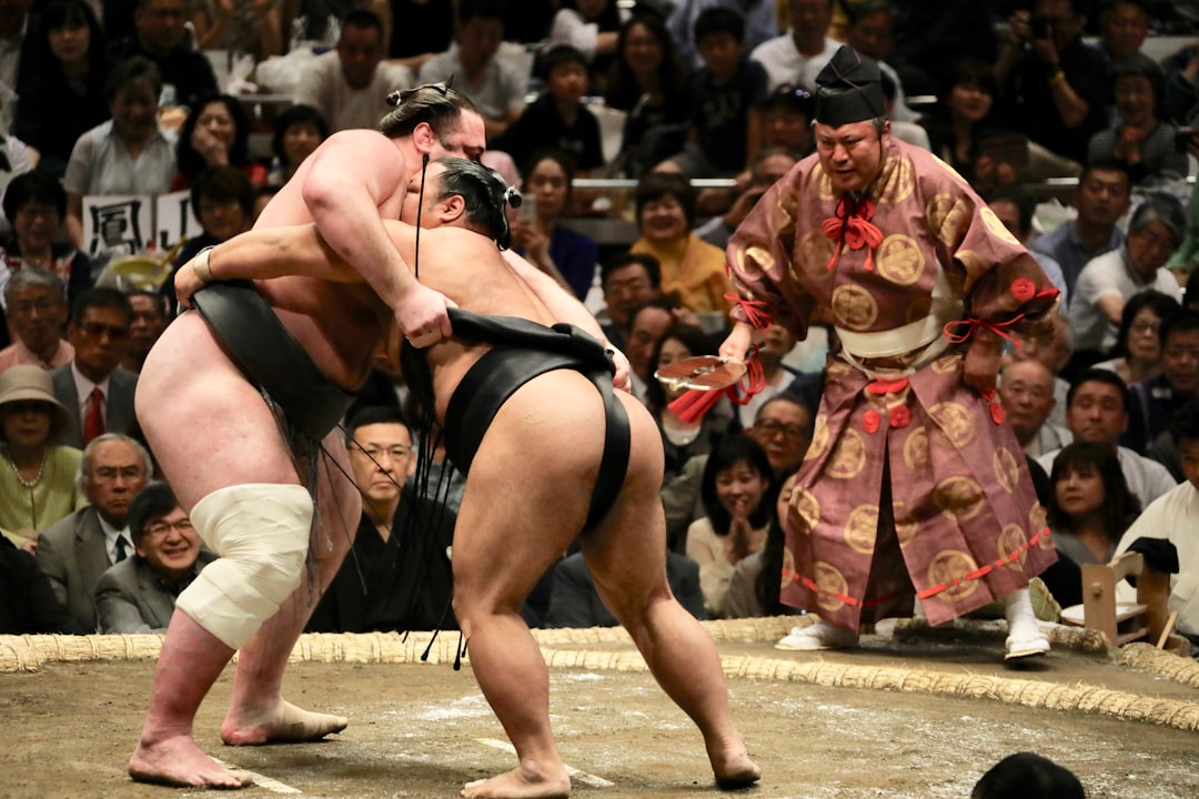 two men in sumo wrestling, Sumo with Ref