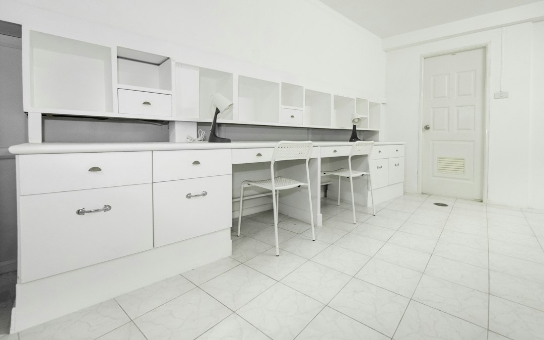 white wooden kitchen cupboards, White desk with chairs and lamp