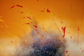 orange, black, and red abstract painting