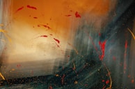 An abstract portrait on a moderately big canvas, blending sharp reds with cool tones to evoke emotion.