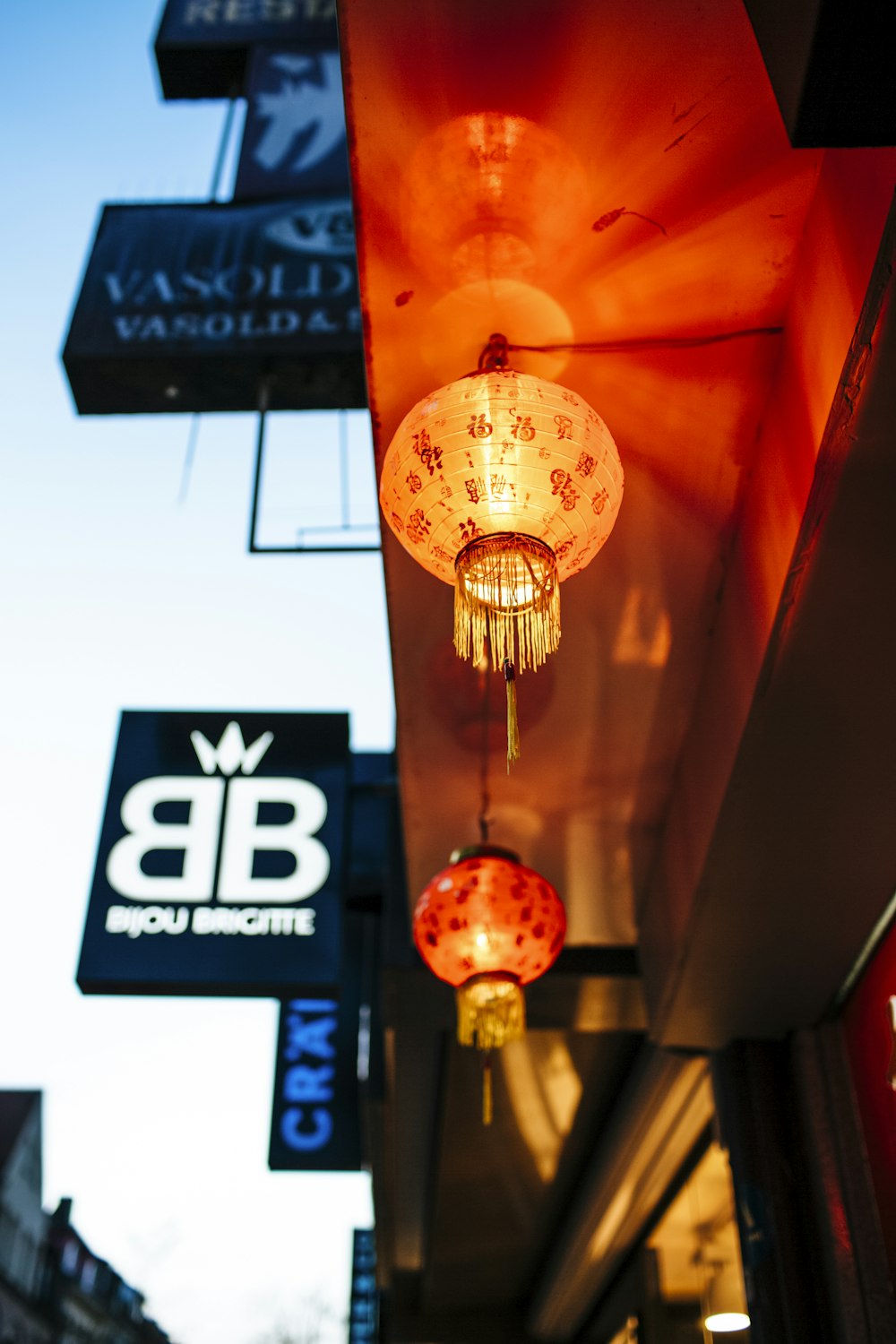 two pendant lamps beside wall