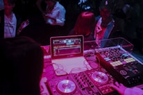 white laptop and audio system