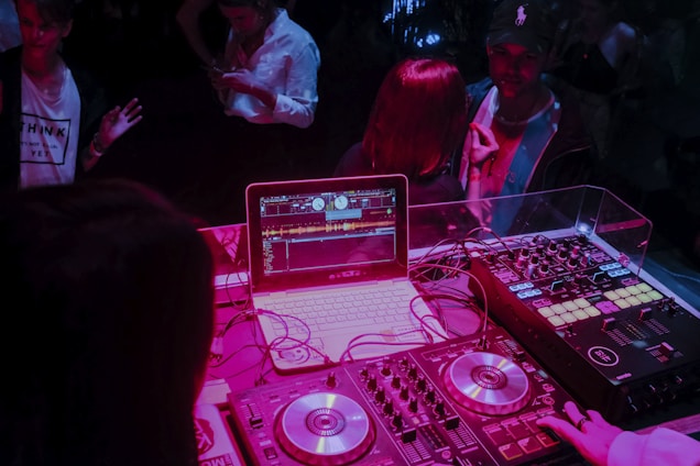 white laptop and audio system