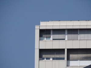 Exterior view of a commercial building with clean windows.