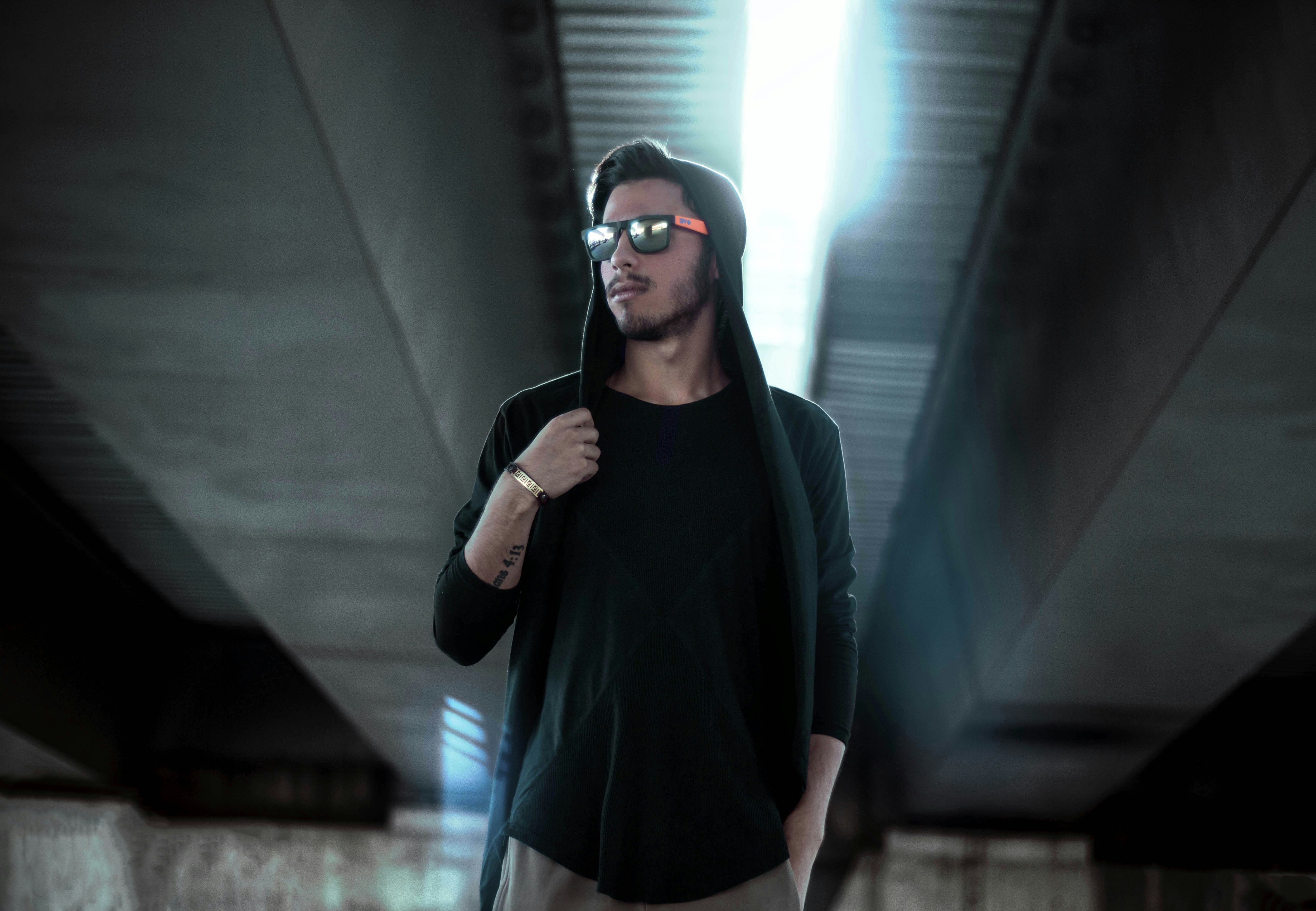 man in black zip-up hoodie