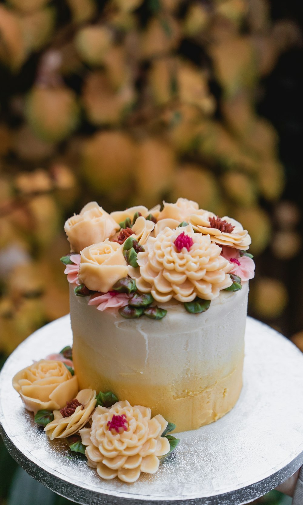 round cake with flowers on top