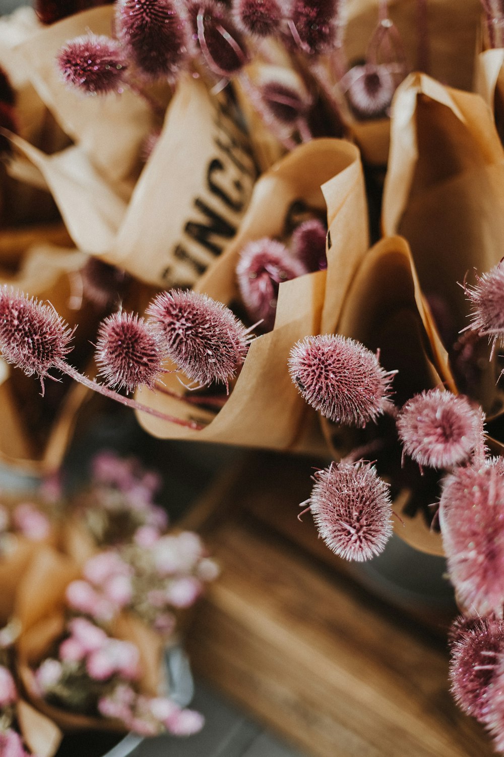 a bunch of dried flowers sitting on top of a table