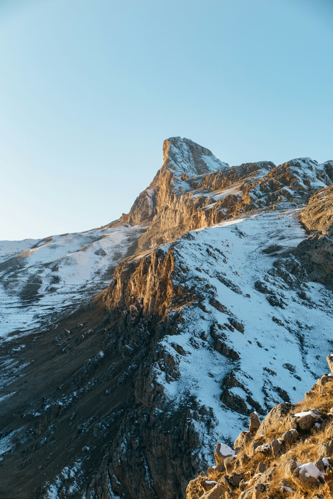 snow-covered mountain during daytime