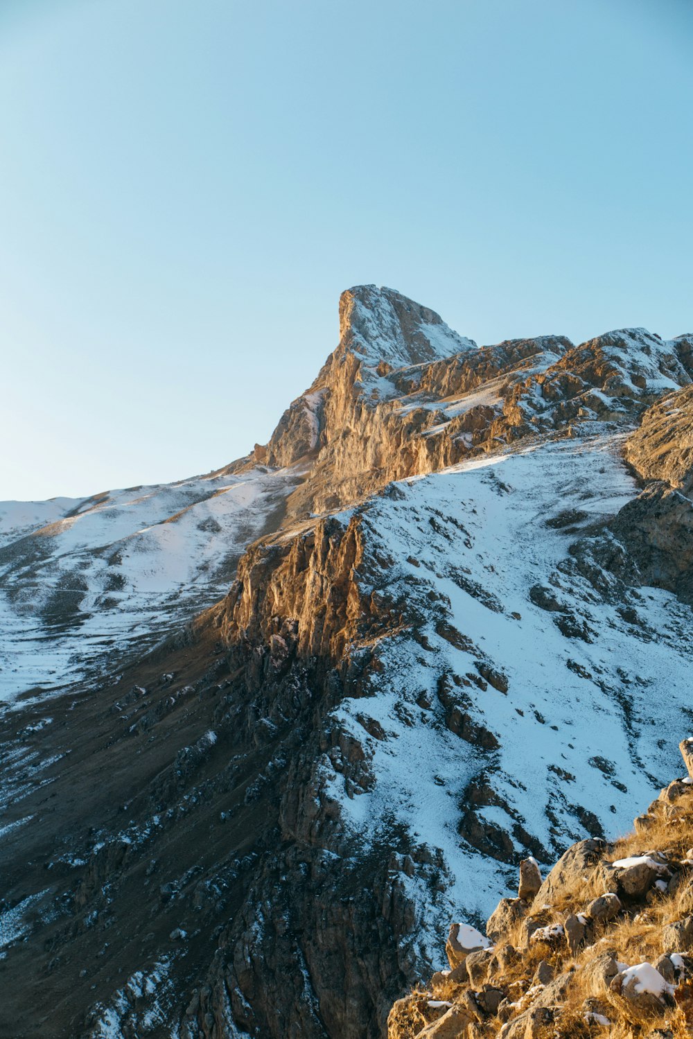 snow-covered mountain during daytime