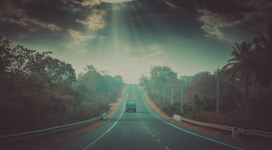 truck traveling on road in Goa India