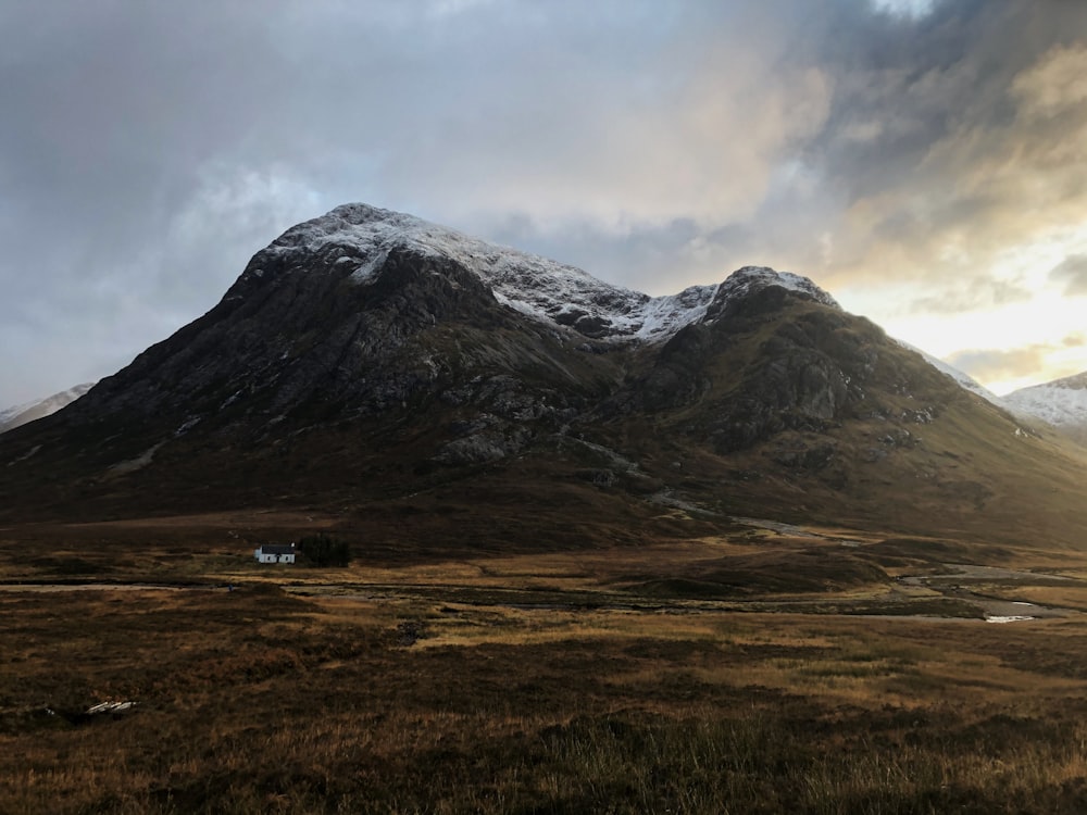 mountain under white sky