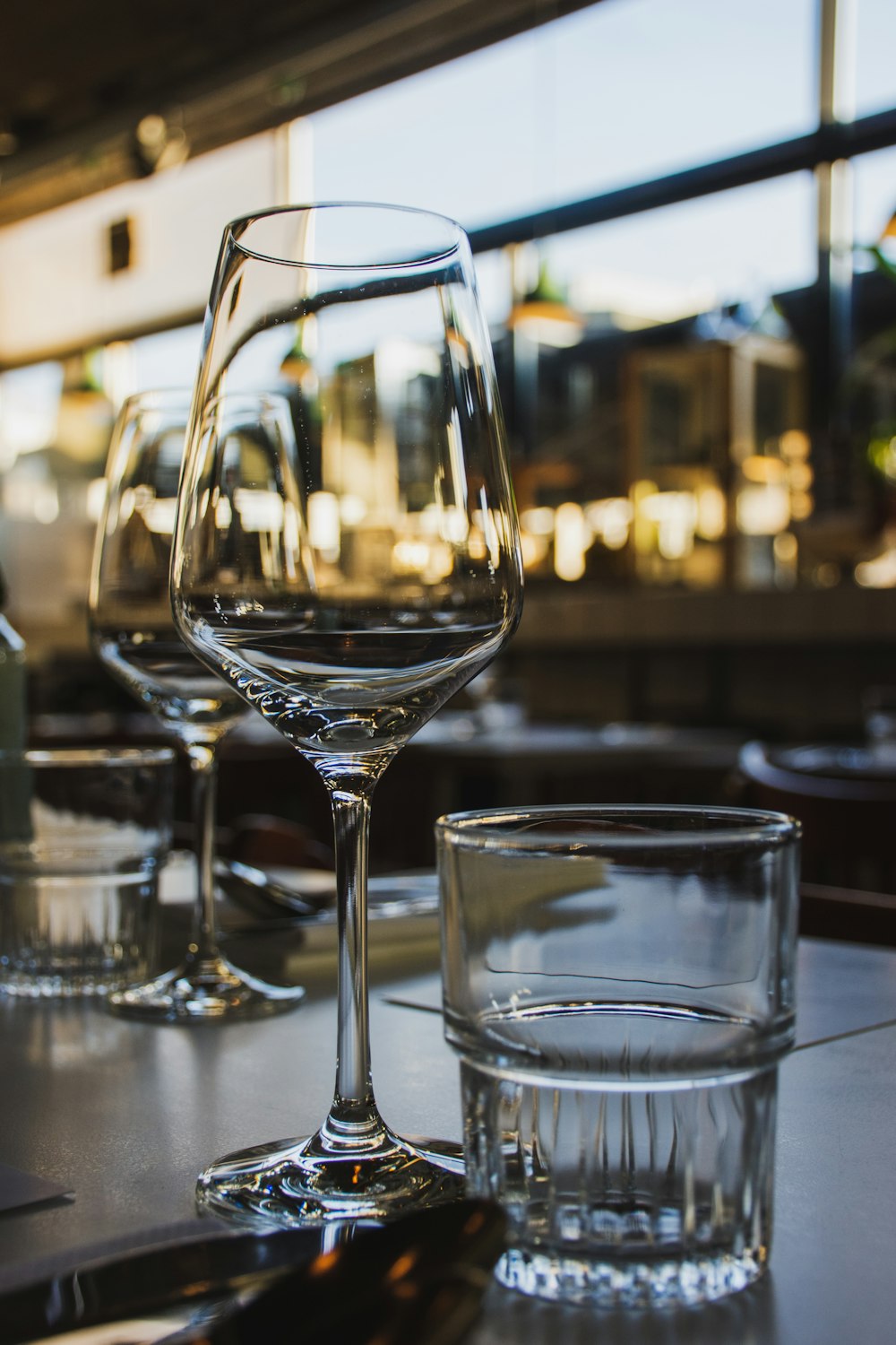 close-up photo of long-stem wine glass