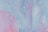 A vibrant abstract painting featuring a fluid mix of pastel colors. Swirling patterns of light blue, pink, and lavender create a dynamic and ethereal composition.