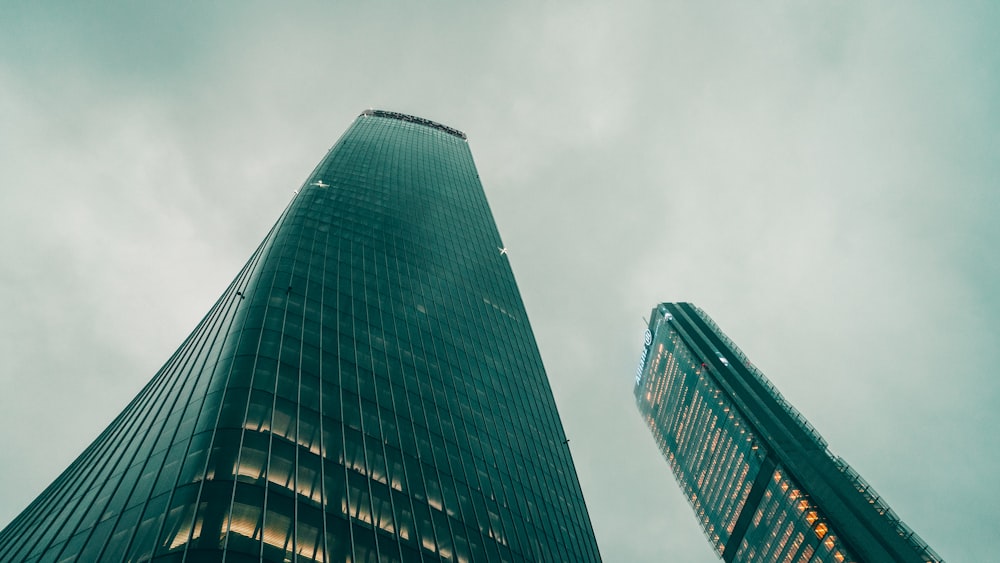 low-angle photo of high-rise building