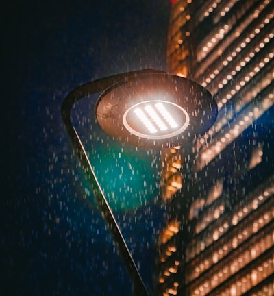 a traffic light with a building in the background