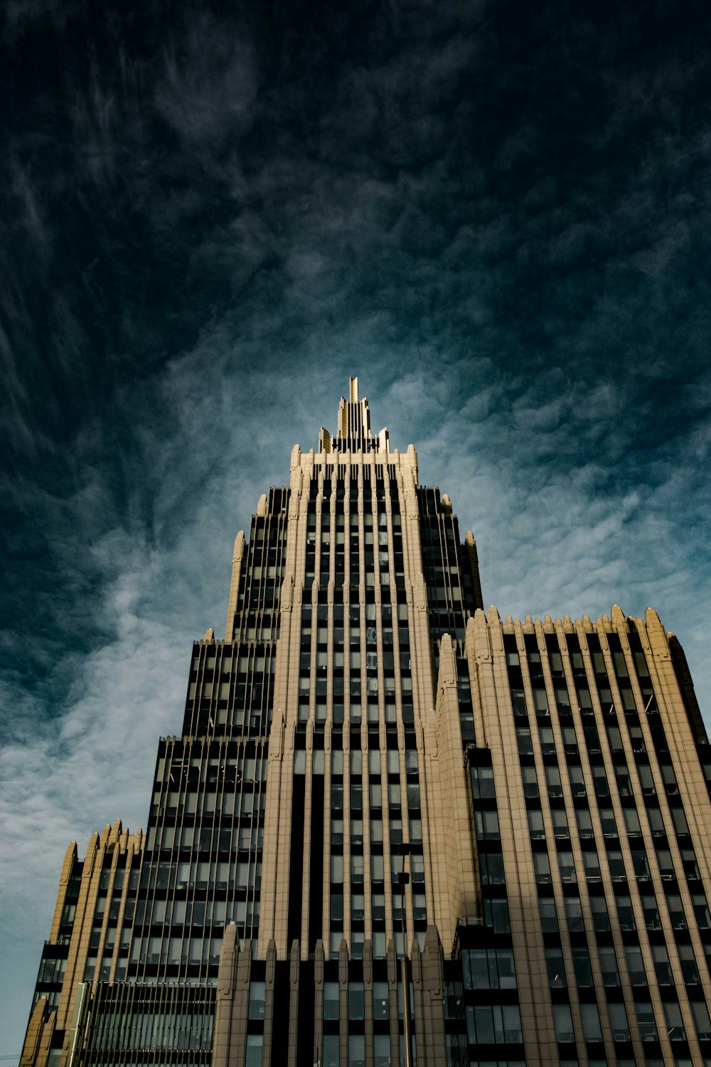 low-angle photography of brown concrete building